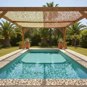 Decorative shade net on a wooden pergola over a swimming pool, providing shade over the water and surrounding area, with earthen pots and palm trees.