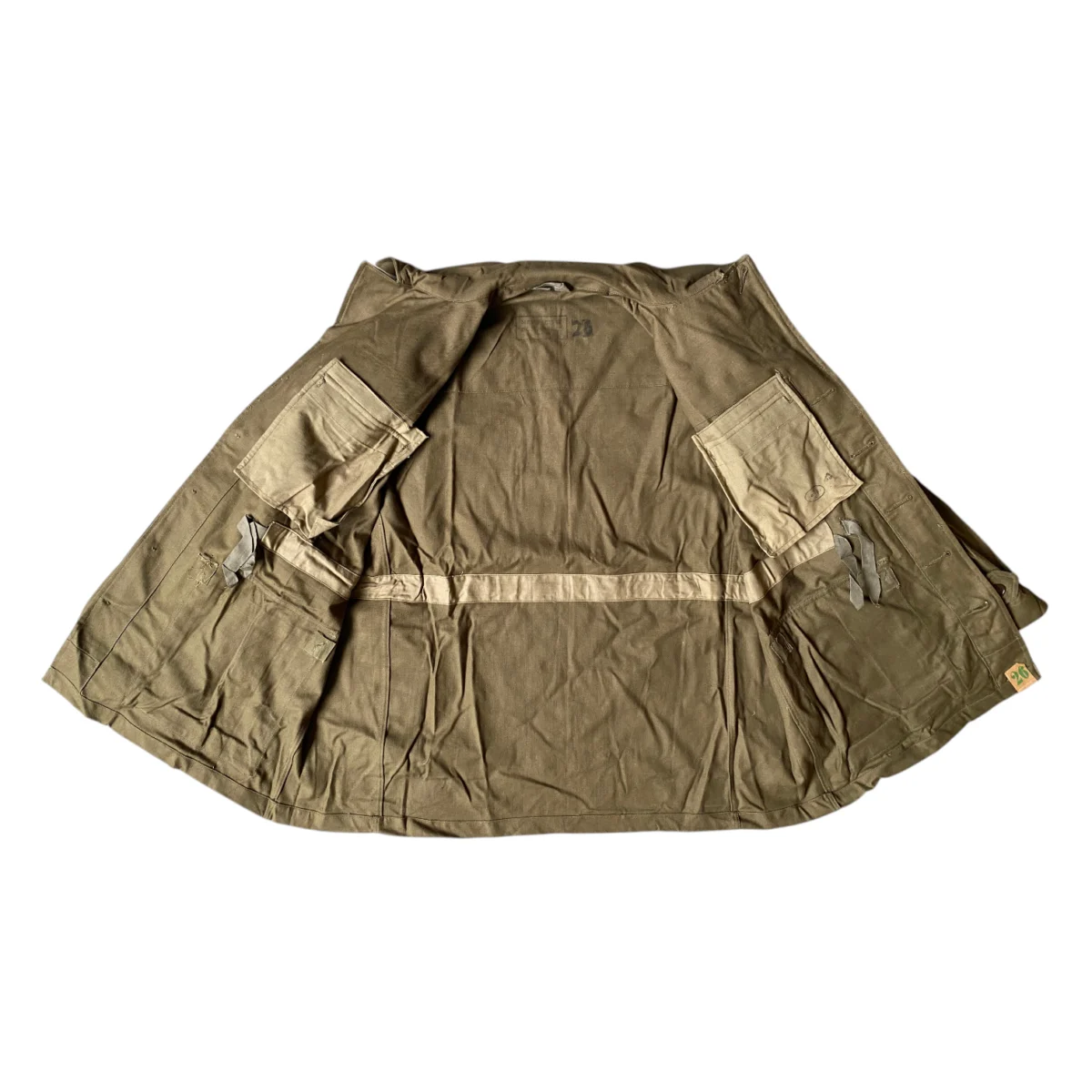 Chaqueta M47 TTA del Ejército francés, modelo militar antiguo de 1947, vista trasera mostrando los bolsillos y el forro caqui.